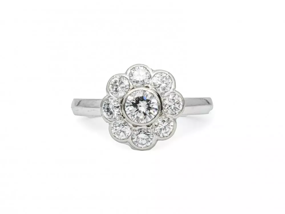 Antieke en Vintage Ringen - entourage ring diamant witgoud 1.70ct.